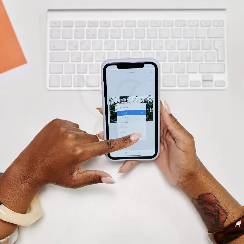 Hands using a smartphone